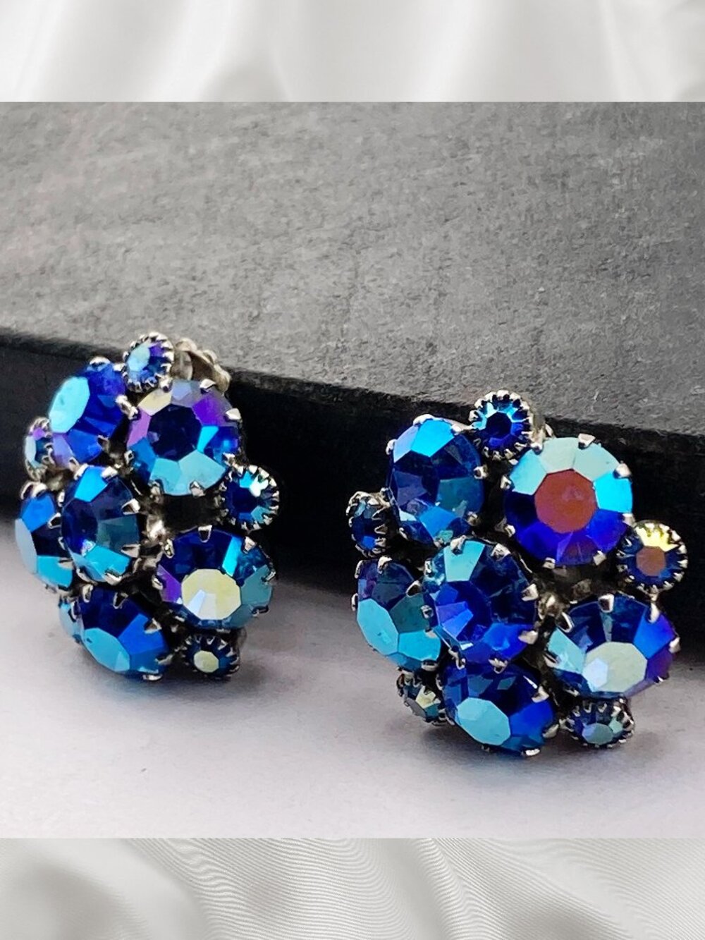WEISS Signed vintage aurora borealis blue rhinestone cluster clip-on earrings